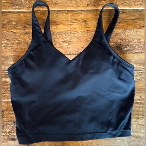 black athletic tank top with built-in bra